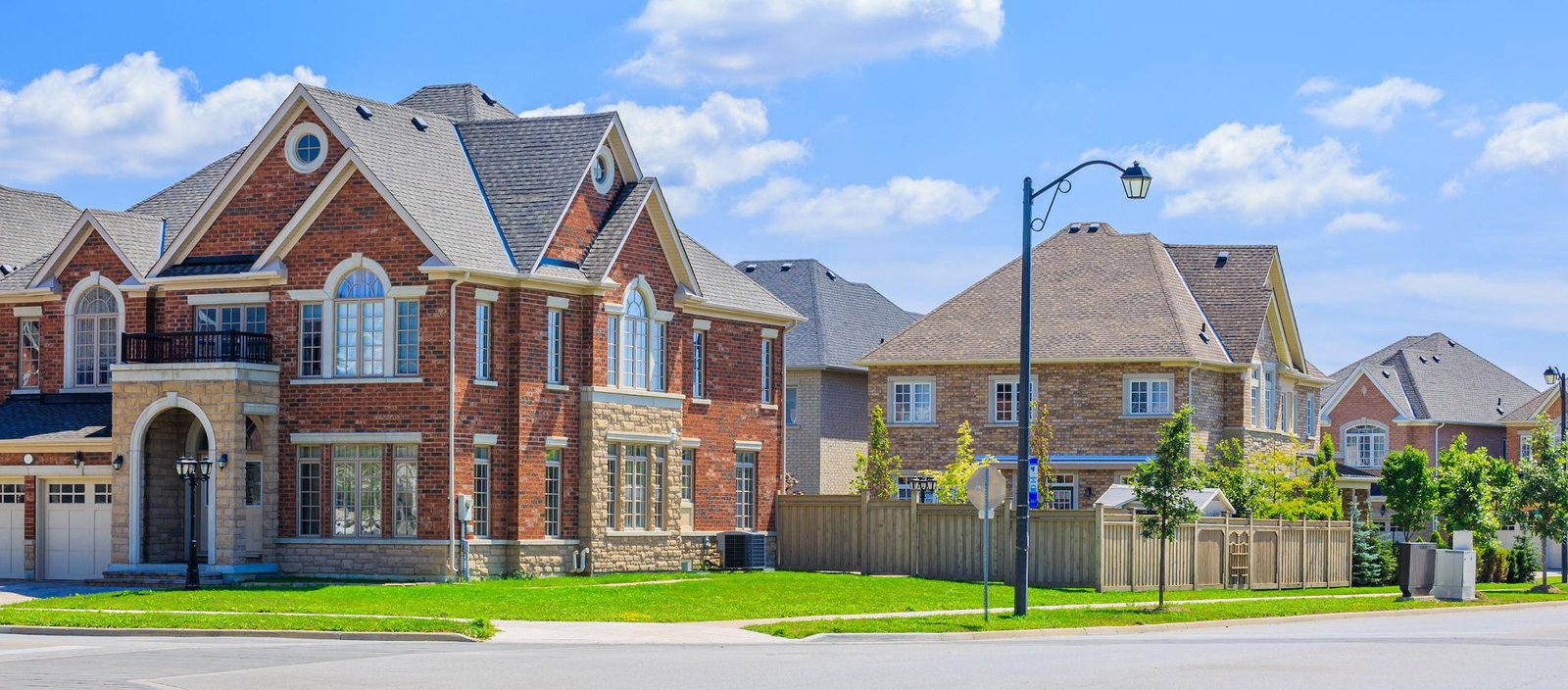 Two-storey brick detached homes at Humber Station by Solmar
