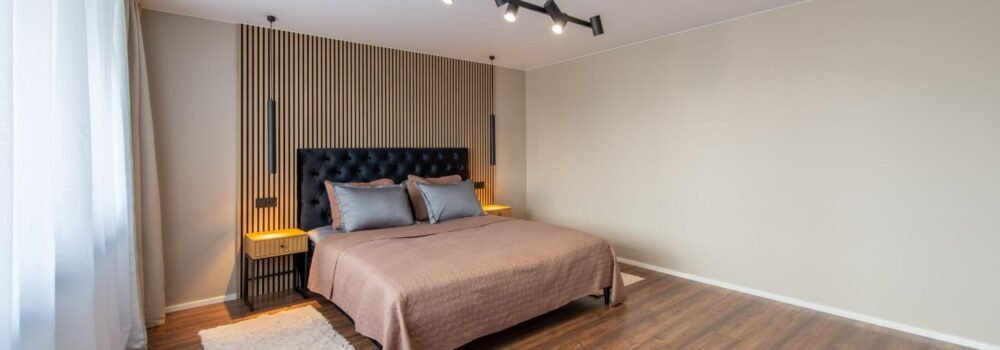Bedroom with wood accent wall interior